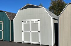 three garages are lined up next to each other