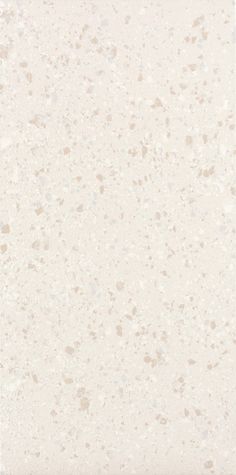 an image of a white and beige wallpaper with speckles on the surface