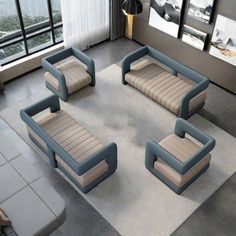 a living room filled with lots of furniture on top of a gray carpeted floor