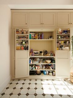 an open pantry with lots of food in it