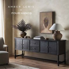 a living room scene with focus on the sideboard