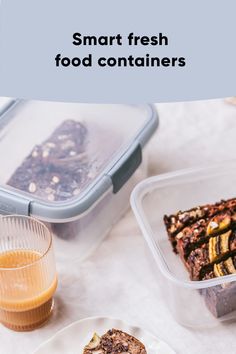 some food is sitting on a table next to a glass and container with orange juice