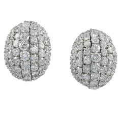 A pair of earrings designed as dome, set with white diamonds and mounted in 18k white gold. Total weight of diamonds is 14.5 carats. G color, VS clarity. Gross weight is 38.35 gr. 1.1 inches long. Earring Displays, Dome Earrings, French Clip, Radiant Diamond, Button Earrings, White Gold Earrings, Jewelry Diamond, Vintage Glamour, Round Brilliant Cut Diamond