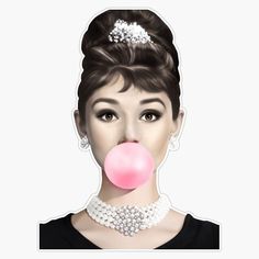 an image of a woman with a bubble gum in her mouth and wearing a tiara