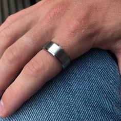 Men's Steel Silver Band Ring - By Twistedpendant (8mm) ✔️8MM THICK! Weighty Stainless steel band with an 8mm thickness. A quality ring for everyday wear! ✔️QUALITY FINISH! Brushed finish for a quality feel.  ✔️DURABLE MATERIALS!Made from Stainless steel for a lasting & non tarnish finish. This ring will never fade or irritate you. ✔️ALL SIZES!Multiple Sizes for Selection - please check the ring size chart. If you cannot see your ring size, please drop us a message. This ring is also unisex with Round Minimalist Titanium Jewelry, Minimalist Round Titanium Jewelry, Classic Titanium Jewelry For Gifts, Mens Black Ring, Mens Pinky Ring, Mens Band Rings, Mens Stainless Steel Rings, Mens Wedding Bands Tungsten, Men Rings