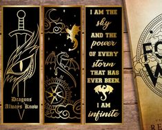 three bookmarks with gold and black designs on them, one reads i am the key and the power of every storm that has ever been i am infinite