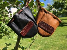 "This is a handmade leather coin pouch crafted for those who seek simplicity in their lives. This minimalistic pouch can fit perfectly in your pocket, backpack, purse, etc. We can STAMP your initials or your name (AS LONG AS YOUR NAME HAS 7 LETTERS OR LESS). During checkout, please, let us know what initials or name you would like us to stamp on your handmade leather coin pouch Measurements: +/- 4.5\" X 4\" X 3.5\" Colors: Black or Brown The high quality soft leather from Wisconsin creates the m Handmade Leather Coin Purse For Personal Use, Hand Tooled Leather Coin Purse For Gift, Leather Coin Pouch, Pouch Craft, Leather Drawstring Bags, Medieval Era, Pouch Handmade, Medicine Bag, Coin Pouch