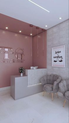 the interior of a hair salon with pink walls and grey chairs in front of it