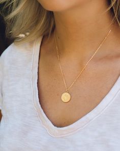 "While you can't use this coin in a store, you can wear it everyday for the perfect accessory. Each necklace is handcrafted with uniqueness.  Chain - 17.5\"  -16K gold plated over brass Plated jewelry is a wonderful, affordable way to add a sophisticated look to your wardrobe, with the look of real gold. It is also an excellent choice for people with sensitive skin. Gold Coin  - Material: Copper, 18K Gold Filled - Size: 20 mm x 15 mm - Quantity: 1 piece - Color: Gold" Everyday Gold Plated Medallion Jewelry, Dainty Brass Coin Pendant Jewelry, Dainty Gold-plated Jewelry With Coin Pendant, Everyday Gold-plated Coin Necklace, Everyday Gold Plated Coin Pendant Necklace, Everyday 14k Gold Filled Coin Pendant Jewelry, Everyday Gold Plated Pendant Coin Necklace, Everyday Gold Plated Coin Necklace, Bohemian Gold Round Pendant Charm Necklaces