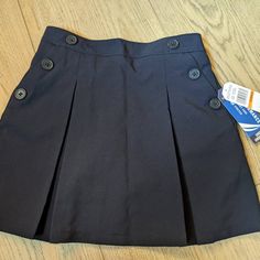 New With Tags Color: Navy Size: Girls' 6x School Uniform Poplin Scooter With Button Pockets Stretch Fabric Pleated Shell With Shorts Underneath Elastic Waistband Girls School Uniform, Navy Uniforms, Pink Polka Dot Dress, Grey Trench Coat, Compression Pants, Skorts, Chino Shorts, Blue Shorts, Denim Top