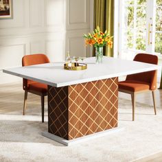 a dining room table with orange chairs around it