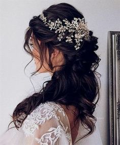 a woman wearing a bridal hair comb