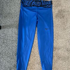 Brand New Without Tags! Size L Electric Blue Nike Leggings Fitted Blue Sportswear Pants, Nike Stretch Blue Bottoms, Nike Blue Stretch Bottoms, Nike Blue Athleisure Pants, Nike Blue Workout Bottoms, Nike Workout Bottoms In Blue, Blue Nike Stretch Activewear, Nike Blue Stretch Activewear, Nike Leggings Women