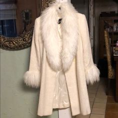 Beautiful Cream Wool Coat. Has A Beautiful Shag Collar And Cuffs. Not Matted. Has One Button For Closure. This Jacket Is A Stunner. I Only Used It Twice For My Wedding In Venice Italy.! It Is A Size 4 But It Is Closer To A 8. The Jacket Has The Ability To Form To Your Body Regardless Of The Size Variation. Cream Wool Coat, Venice Italy, My Wedding, Collar And Cuff, Wool Coat, Venice, Size 4, Jackets & Coats, Jackets For Women