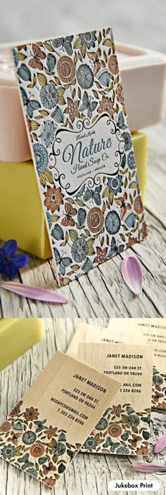 the wedding stationery is on display in front of some flowers and other things that are around it