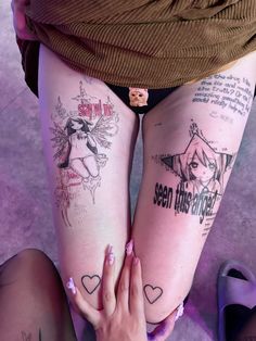 two women with tattoos on their legs