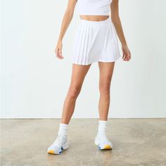 New W Tags Tennis Skirt Casual Spring Tennis Skirt With Built-in Shorts, Chic White Skirt With Built-in Shorts, White Skirt With Built-in Shorts For Day Out, Spring Mini Pleated Skirt With Built-in Shorts, Sporty Pleated Mini Skirt For Spring, Spring Skort With Built-in Shorts And Relaxed Fit, Spring Relaxed Skort With Built-in Shorts, Sporty Pleated Bottoms For Summer, Sporty Mini Pleated Skirt For Summer