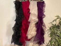 "Trendy stylish ruffle dupatta. Ready to ship in 4 colors. Any design or color can be made on order. Please feel free to contact. Fabric: for black, maroon, purple is Pakistani tissue/organza. For white n gold is organza masuri net. Measurements: White n gold: Approx. 80\"-82\"long All other colors: Approx. 95\"-100\" long Note: Due to the photographic lighting & different screen calibrations, the colors of the original product may slightly vary from the picture" Elegant Organza Dupatta With Ruffles, Party Dupatta With Ruffles In Organza, Party Organza Dupatta With Ruffles, Ruffled Dupatta For Festive Party, Festive Party Dupatta With Ruffles, Festive Ruffled Dupatta For Party, Elegant Ruffled Dupatta For Party, Elegant Festive Dupatta With Ruffles, Elegant Ruffled Dupatta For Festive Occasions