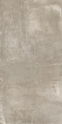 an image of a concrete wall textured with paint or cement pastel colors in shades of grey and white