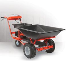 an orange and black wheelbarrow with two wheels on the side, attached to a white wall