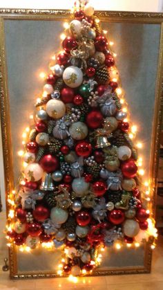 a decorated christmas tree with lights and ornaments