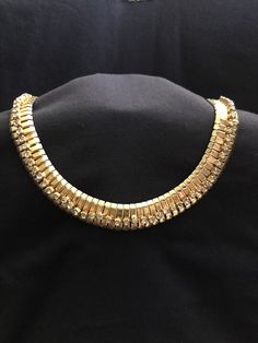 "1940/1950 Gold Toned Egyptian Revival Type Necklace - has rhinestones lined up in the middle of the necklace and the rhinestones stand up in a 3D fashion - necklace is 17\" long - has patina on the back - heavy and lays well - great statement piece - normal wear and scratches" Vintage Gold Jeweled Rhinestone Necklace, Vintage Gold Rhinestone Necklace, Vintage Rhinestone Party Necklace, Antique Gold Jewelry With Rhinestones, Vintage Necklace With Diamond Accents For Evening, Vintage Rhinestone Necklaces For Evening, Vintage Rhinestone Evening Necklaces, Vintage Jeweled Necklaces For Anniversary, Vintage Gold Rhinestone Necklace For Parties