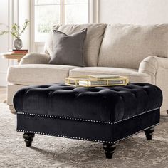 a living room scene with focus on the ottoman