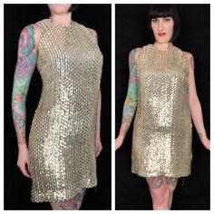 "Dazzling Vintage 1960's Metallic Gold Fully Sequined Mod Cocktail Party Go Go Shift Dress! Features: - gold metallic fully sequined woven fabric on a white acetate body - rounded neckline - darts at bust - straight A-line shift dress shape - gold metallic piping trim - 2 metal zipper closures up back; 1 on the outer sequin body, and the 2nd zipper for the lining - fully lined in a white acetate - extremely well made! The hidden double zipper feature shows a lot of detail went into making this p Gold Embellished Sleeveless Sequin Dress, Glamorous Gold Mini Dress For Holiday Party, Gold Fitted Disco Dress, Gold Sleeveless Shimmer Mini Dress, Gold Sleeveless Mini Dress With Shimmer, Gold Mini Dress For Cocktail Holiday Events, Gold Disco Evening Dress, Gold Shimmer Sleeveless Mini Dress, Gold Shimmer Mini Dress For Party Season