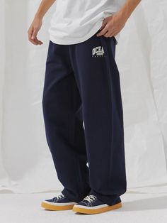 Editor's notesOversized Silhouette Sweatpants offer ultimate comfort and style. They feature a relaxed fit with a logo artwork print on the front pockets and a brand label on the back pockets. - The waist can be adjusted with a string for size adjustment.- The bottom can also be adjusted in size with a string and stopper, allowing for various stylings.* Product color may vary slightly depending on the user's monitor resolution.* The product detail images are most similar to the actual Navy Relaxed Fit Athleisure Pants, Navy Relaxed Fit Sports Pants, Navy Bottoms For Streetwear, Casual Blue Sweatpants With Letter Print, Casual Blue Letter Print Sweatpants, Navy Casual Pants With Straight Hem, Navy Relaxed Fit Bottoms For Streetwear, Navy Athleisure Pants For Streetwear, Navy Straight Leg Bottoms For Streetwear