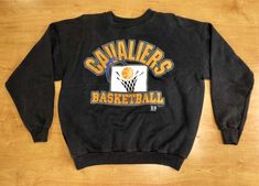 a black sweatshirt with the word cavalers basketball on it