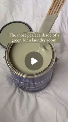 the most perfect shade of a green for a laundry room is this white painted paint