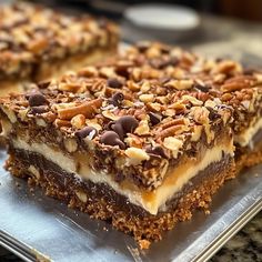 two pieces of dessert sitting on top of a pan