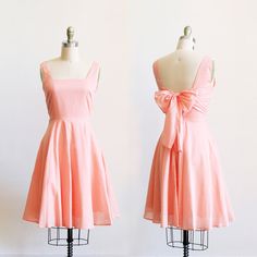 "+ D E T A I L S - a fit & flare vintage style sundress in breathable and natural fibers.  - 100% cotton peach dress with apron square neckline and sleeveless bodice - full gored circle skirt with a knee length, modest hemline + pockets! - 1950s inspired classic vintage modern dress   - open back cut out with whimsical bow scarf tie - looking for a casual or cocktail summer dress? This is a dress for all occasions : bridesmaid dress, weddings, events, wear to work and everyday. Shopping for another color? EMMA is available in 4 colors: [COMING SOON] + M E A S U R E M E N T S | US | bust | waist | hip | XS | 0 | 32\"-33\" | 25\"-26\" | 35\"-36\" S | 2-4 | 34\"-36\" | 27\"-28\" | 37\"-38\" M | 6-8 | 36\"-38\" | 29\"-30\" | 39\"-40\" L | 10-12 | 38\"-40\" | 31\"-32\" | 41\"-42\" XL | 14 | 40\ Cocktail Summer Dress, Casual Bridesmaid, Dress With Apron, Light Blue Bridesmaid Dresses, Light Blue Bridesmaid, Peach Bridesmaid, Sky Blue Bridesmaid Dresses, Peach Bridesmaid Dresses, Cocktail Summer