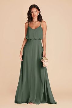 a woman in a green bridesmaid dress