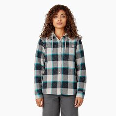 Discover the most versatile outer layer that delivers on the promise of warmth, comfort and protection in Dickies Women’s Flannel Hooded Shirt Jacket. Combining the lived-in feel of a hoodie, the warmth of flannel shirt, and the security of a jacket, this workday essential will check the box for function and style. Featuring a soft flannel fabrication equipped with a cozy jersey lining and hood, you’ll embrace the cold climate with ease in this quilted shirt jacket. You’re covered in wet weather Quilted Shirt Jacket, Shirt Jacket Womens, Quilted Shirt, Denim Trench Coat, Dickies Women, Classic Trench Coat, Flannel Women, Hooded Shirt, Wet Weather