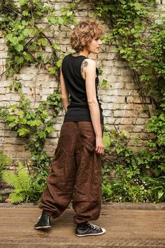 Brown linen pants for man or woman. Unisex Men and Women Can Wear. Cozy and comfortable brown linen trousers. Perfect for yoga, meditation or traveling. Unique baggy fit. Brown harem pants. Two ventilate pockets in front, two back pocket, secret pocket. Flax linen 100%. Made in EU. Other available linen colors: https://www.etsy.com/shop/PeuShop?ref=seller-platform-mcnav&section_id=16595726 * Care Instructions: Washing machine or hand wash, up to 30 oC, hang to dry. Size (in/cm)Length (in/cm) Brown Harem Pants With Pockets, Brown Baggy Linen Bottoms, Baggy Brown Harem Bottoms, Brown Cotton Harem Pants, Baggy Brown Harem Pants, Brown Linen Long Pants, Baggy Brown Linen Pants, Brown Loose Fit Wide Leg Harem Pants, Brown Harem Pants With Loosely Fitted Wide Legs