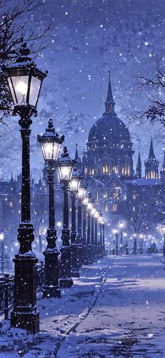 a snowy night in the city with street lights and buildings lit up by street lamps