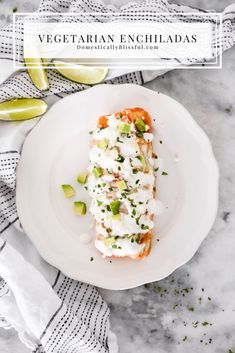 vegetarian enchiladas on a white plate