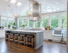 a large kitchen with an island and lots of counter space