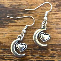 Cute, Dainty, Simple And Fun! Brand New Silver Metal Alloy Crescent Moon And Valentine Heart Shaped Dangle Earrings. Adds A Subtle Sweet Splash Of Shine To Any Look, Perfect For Summer! Makes An Excellent Gift Lots Of Options! Bundle Any Three Pairs Of Earrings Labeled 3/$15 And I’ll Accept Your $15 Offer. 20% Off 3+ Items And I Consider Trades Adjustable Metal Heart Earrings, Metal Heart Dangle Earrings, Adjustable Nickel-free Heart Earrings, Adjustable Dangle Heart Earrings, Nickel Free, Pink Pearl Earrings, Mexican Earrings, Gold Bead Earrings, Pumpkin Earrings, Handmade Fashion Jewelry