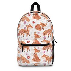 a backpack with foxes and flowers on the front, it is also available for children