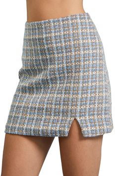 Tweed Mini Skirt: This tweed mini skirt is a timeless classic. Pair it with the matching blazer, The Cher Tweed Blazer to complete the look. Make it your own by french tucking an oversized sweater or a trendy chic bodysuit. This skirt is lined with a back zipper closure and a small front side slit. Sizing does run small in this skirt, sizing up is recommended.Material:Self:• 100% PolyesterLining• 100% PolyesterCare:• Hand wash cold water separately• Color may bleed when washing • Do not bleach• Tweed Mini Skirt, Trendy Chic, Tweed Blazer, Classic Mini, Oversized Sweater, Timeless Classic, Boho Shorts, Mini Skirt, Cold Water