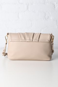 Discover the perfect blend of style and practicality with our Vegan Leather Crossbody. The foldover flap secured by a magnetic snap, along with ruched details, adds a touch of sophistication. The versatility of the braided detachable shoulder strap and adjustable crossbody strap makes this bag an ideal companion. Organize your essentials effortlessly with the fabric-lined interior featuring a zip pocket and slip pocket. Item Type: Crossbody Material: Vegan Leather Closure: Foldover Flap with Mag Maxi Romper, Workwear Fashion, Weekend Style, Active Wear Outfits, New Tops, Active Wear Tops, Top Shoes, Crossbody Strap, Leather Crossbody