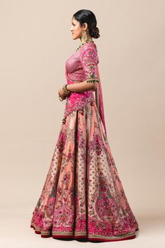 Blush silk dupion lehenga with flat zari worked motifs. Paired with resham and zari grid embroidered blouse and tassel dupatta.
Component: 3
Embroidered
Neckline: U Neck
Sleeve Length: Half
Fabric: Lehenga: Silk Dupion; Dupatta: Handloom; Blouse: Net
Color: Pink
Cutout back
Bead tassels
Cutwork detail - Aza Fashions Tarun Tahiliani Bridal, Lehenga Silk, Embellished Veil, Bead Tassels, Pink Lehenga, Embroidered Lehenga, Tarun Tahiliani, Indian Aesthetic, Silk Lehenga