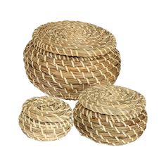 three woven baskets stacked on top of each other in the shape of four round baskets