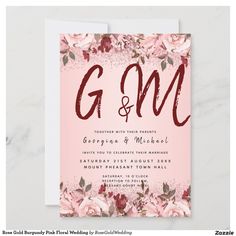 wedding card with pink flowers and the word g & m on it in red ink