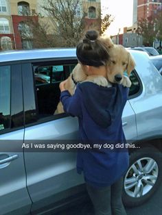 a woman holding a dog in her arms while standing next to a silver car with the caption'this is so cute as i was saying goodbye, my dog