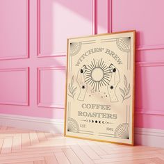 a pink room with a coffee poster on the wall and wooden flooring in front of it