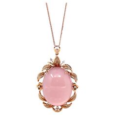 * DESIGN CONCEPT---18k Rose Gold & Natural Rose Quartz Pendant Necklace. This pendant made with high-quality genuine pink rose quartz. The rose quartz is striking yet elegant. Rose quartz represents the bananas between relationships. The design is a classic oval style. The rose quartz truly special, weighing in at almost 80 carats. And more than 100 diamonds surrounding the glamorous center stone make this neck-piece just that much more special. Every detail and Every angle are graceful. Every d Luxury Oval Cabochon Necklace, Luxury Pink Oval Necklace, Elegant Pink Cabochon Necklace, Formal Pink Cabochon Necklace, Luxury Pink Cabochon Jewelry, Formal Pink Rose Quartz Jewelry, Rose Quartz Pendant Necklace, Rose Gold Chain Necklace, Rose Quartz Necklace Pendants