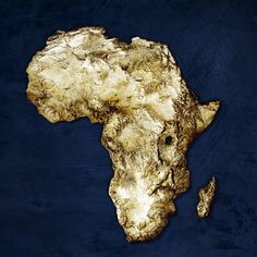 a gold foiled map of africa on a dark blue background, with the shape of an elephant's head